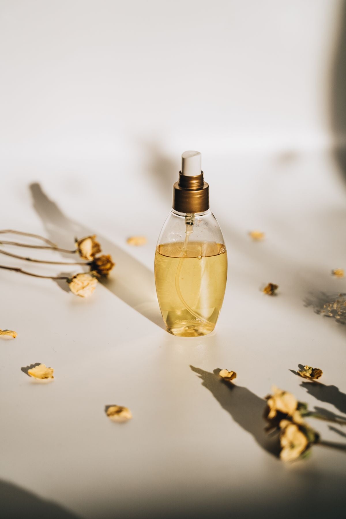 Fragrance bottle with dried flowers